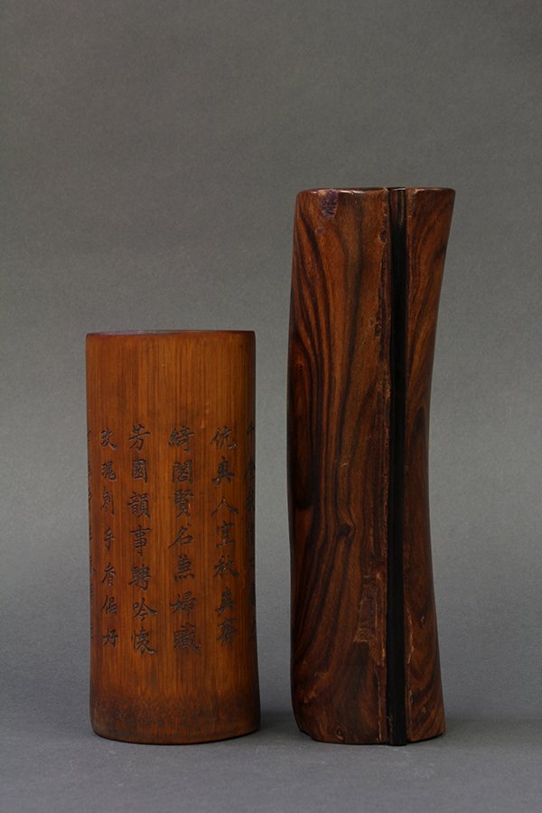 Chinese Wood/Bamboo Brush Pots: (lot of 2) Chinese bamboo and wooden brush pot, the first of cylindrical form with a long poetic colophon, followed by the name 'Lan yin ju shi'; the other of a contoured form flanked by two thin wood