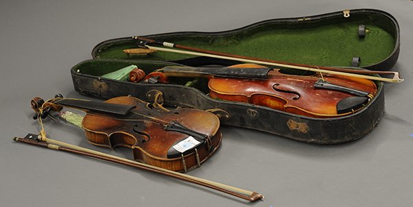 Antique violins and Paesold bow: (lot of 4) Antique violins and Paesold bow, consisiting of a violin retaining a hard case, a child's violin with German Stradivarius label, 21"l., and a child size bow, 24"l., together with a Paesold 