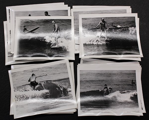 Surfing photographs by LeRoy Grannis: (lot of 35) LeRoy Grannis (Californian, 1917-2011), ''Surfing - 22nd Street Pier (California),'' 1960, unframed photographs, each stamped ''Aug 7, 1960'' verso, print (each): 4''h x 5''w. Provenance: 