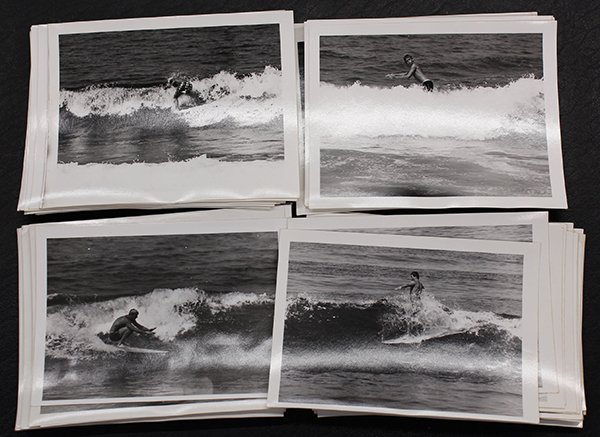 Surfing photographs by LeRoy Grannis: (lot of 63) LeRoy Grannis (Californian, 1917-2011), ''Surfing - 22nd Street Pier (California),'' 1960, unframed photographs (some featuring rare female surfers), each stamped ''July 13, 1960'' verso, 