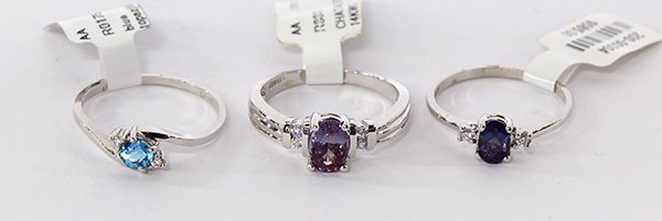 (Lot of 3) Diamond detailed rings: (Lot of 3) Diamond detailed rings mounted in 14k white gold, (2) with chatham created alexandrites, one with blue topaz; size 6.5 to 7. Provenance: Closed Sonoma County Jewelry Store