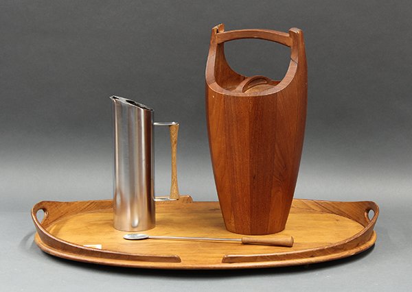 Mid century modern bar accessories: (lot of 3) Mid century modern bar accessories, consisting of a Jens Quistgaard for Dansk teak ice bucket with lid,15.5"h, an oval teak tray with raised conforming handles marked Dansk, 3"h x 26"w x 19