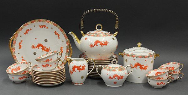 Bavarian dessert service for 8 plus extras: (lot of 24) Bavarian dessert service for 8 plus extras, by Thomas, Bavaria, executed in the Asian taste, having dragon and sun reserves with partial gilt accents, consisting of (10) desert plates, 7"d