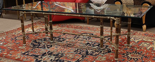 McGuire, San Francisco, dining table: McGuire, San Francisco, dining table, the bevelled glass top above a conjoined rattan base with a central box stretcher, 29"h x 96"w x 43"d