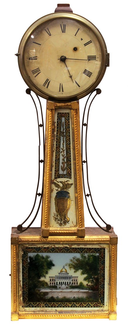 Federal eglomise decorated banjo clock: Federal eglomise decorated banjo clock, possibly Boston first quarter 19th century, the circular dial with Roman markers surmounting the two window eglomise decorated panels, each with giltwood carved