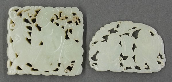 Chinese Reticulated Jade Plaques: (lot of 2) Chinese jade pierced plaques, one featuring Hehe Erxian; the other of celadon hue carved with a scholar mounted on a qilin, 2.75"w