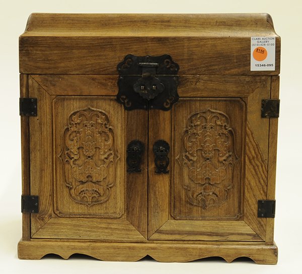 Chinese Carved Seal Chest: Chinese wooden seal chest, possibly Vietnamese huanghuali, the lid carved with a pair of gui-dragon opening to reveal a shallow compartment, fronted by a pair of hinged doors each with bat suspending 