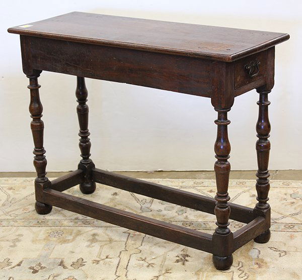 Diminutive console created from 18th century tavern: Chippendale style hall table, comprised of 18th century elements, the rectangular top having a single drawer rising on turned legs conjoined by the box stretcher, 29"h x 37"w x 14"w.