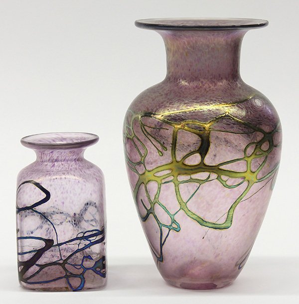 Robert Held iridescent art glass group: (lot of 2) Robert Held iridescent art glass group, each having an oil spot surface continuing from gold to lavender, centered with an abstract pulled detail continuing to the base, each with etched si