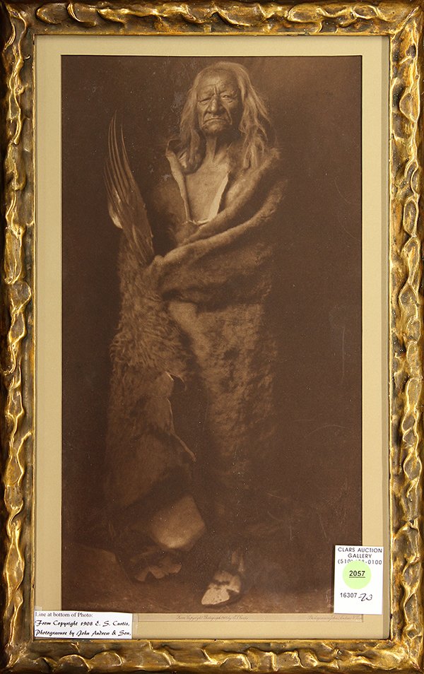 Edward Curtis framed photogravure: (lot of 2) Edward Sheriff Curtis (American, 1868-1952), framed photogravure, marked: "From copyright 1908 E.S. Curtis, photogravures by John Andrew & Son", 17.5"h x 11"w overall; together with the boo