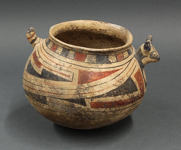 Casas Grandes effigy pottery: Casas Grandes polychrome decorated effigy pottery, prehistoric Southern Arizona/Northern New Mexico, circa 800-1200 AD, the bulbous body having abstract geometric decoration, accented with head and ta