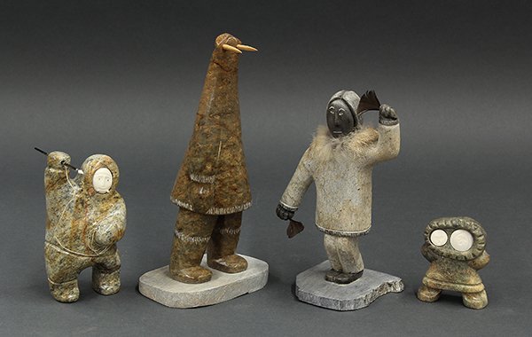 Inuit, authentic Alaskan carvings: (lot of 4) Inuit, authentic Alaskan carvings consisting of a whale hunter, a seal having human body, etc. Provenance: Property from the collection of the Dr. Mary Anne Warren Estate