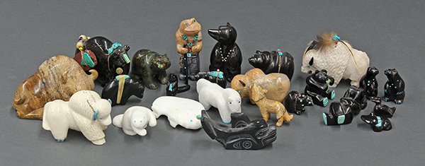 Zuni, New Mexico finely carved stone fetishes: (lot of 23) Zuni, New Mexico finely carved stone fetishes of animals including musk ox, and bears, some having coral and turquoise accents, largest: 4"l. Provenance: Property from the collection of th