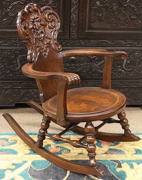 American Michigan Chair co: American Michigan Chair co. quartersawn oak rocking chair centered with a Northwind carved medallion