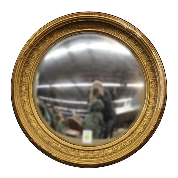 Regency style convex mirror: Regency style convex mirror, having a carved and molded giltwood frame surrounding the looking glass, 21"d