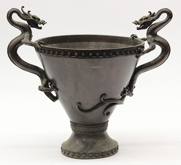 Japanese bronze, Seimin, Edo Period,: Japanese bronze vase, Edo period, of conical form with a pair of dragons form handles flanking the bead rim, raised on a splayed base marked with 'Seimin" (Murata Seimin, 1761-1837), 12.75"h