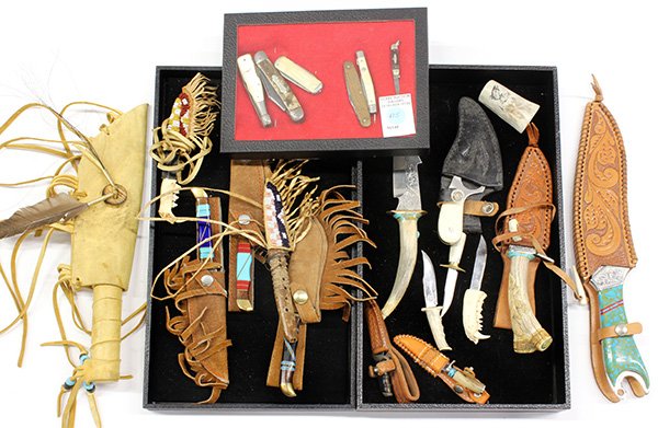 Southwest style knives: (lot of 16) Southwest style knives and hand weapons including hunting knives of assorted sizes in leather sheathes, and mounted with carved horns, animal teeth, and inlaid handles; together with a lea