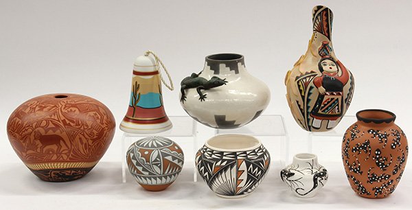 South Western ceramics: (lot of 8) South West ceramics including a lizard effigy pot, an Acoma style pot, and a Laguna style seed jar Provenance: Property from the collection of the Dr. Mary Anne Warren Estate