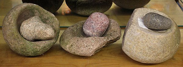 Native American antique stone mortar and pestles: (lot of 3) Native American antique stone mortar and pestles, pre 19th century, tallest: 7"h. Provenance: Property from the collection of the Dr. Mary Anne Warren Estate