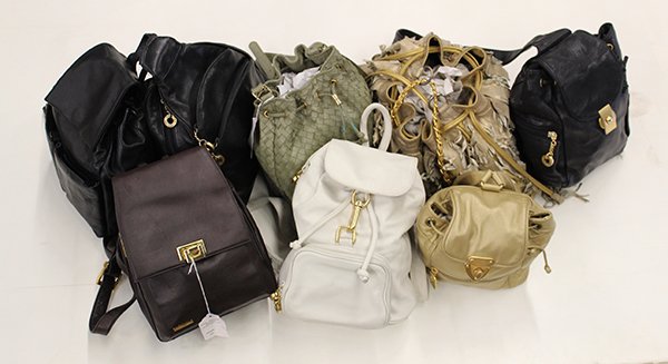 Fashion leather bags: (lot of 8) Fashion leather bags mostly Perlina back-pack style; together with a Bebe gold lame fringe drawstring shoulder bag Note: Sold on behalf of the Bankruptcy Trustee. There is no Buyer's Premiu