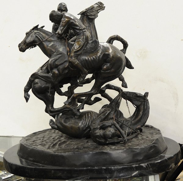 'Polo' bronze after Frederic Remington,: 'Polo' bronze, after Frederic Remington, depicting three polo players in the midst of a heated battle, one is down along with his horse, all rising on an oval base bearing impressed signature, 'Freder