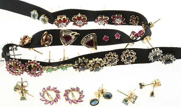Collection of gold jacket stud earrings tourmaline fire: (Lot of 18) Pairs of earrings mostly of 14K and 10K gold, in stud and cluster styles set with tourmaline, fire opal, ruby, sapphire, garnet, emerald and other gemstones; Including four pairs of earrin