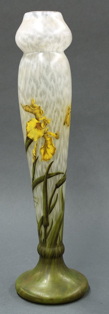 Daum Nancy art glass vase: Daum Nancy art glass vase, circa 1905, executed in the Art Nouveau taste, the tapered body with hand enameled iris sprays in yellow and green on a mottled ground, and rising on a circular base, signed