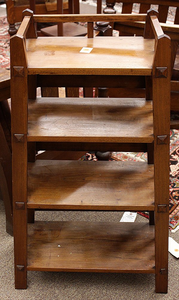 Arts and Crafts magazine stand: Arts and Crafts magazine stand, the spindle sides supporting four graduated shelves, and rising on square legs, 42"h x 24.5"w x 11"d