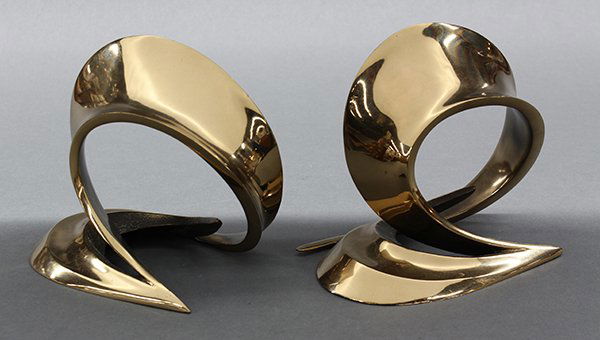 Bookends, Bob Bennett/Bennett Brothers: (lot of 2) Bob Bennett/Bennett Brothers (American, 20th century), "Cycle Bookends," 1984, bronze sculpture, signed and dated lower center bottom, edition 19/250, overall (each): 6.5"h x 8.75"w x 4"d.
