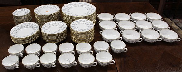 Spode gilt and transfer decorated bone china: (lot of 83) Spode gilt and transfer decorated bone china partial table service for eighteen in the Colonel pattern, consisting of (14) dinner plates 10.5"dia., (18) luncheon plates, (18) bread plates,