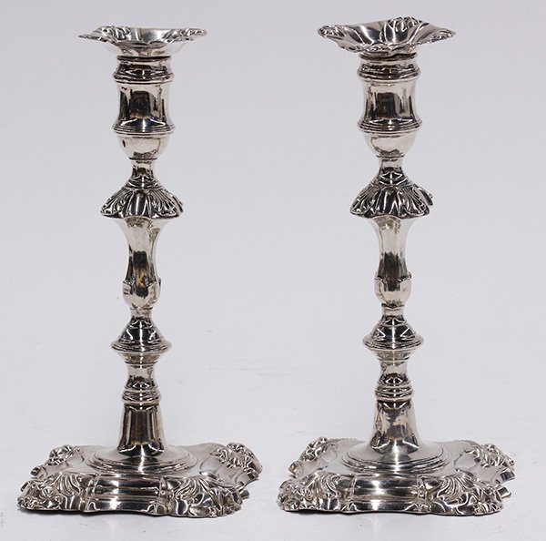 Pair of George III sterling silver candle holders: Pair of George III sterling silver candle holders, possibly by William Cafe, London, 1762/1763, each of classic form having removable bobeches, ring turned details, and accented with an overall acanth