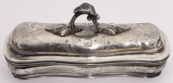 Russian .875 silver-gilt covered box/surface accessory: Russian .875 silver-gilt covered box/surface accessory, 1843, by Johann Bernhard Hertz, St. Petersburg, 1834-1855, the shaped rectangular form decorated with incised scrolling floral acanthus and bear