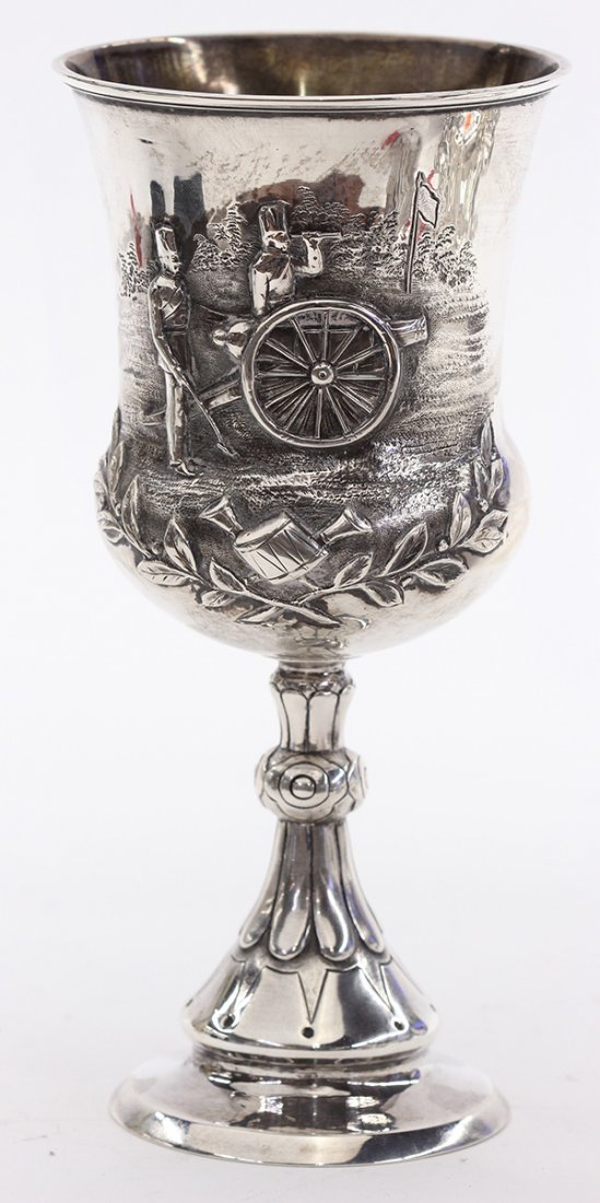 English Renaissance Revival sterling silver chalice: English Renaissance Revival sterling silver chalice, London, 1863, the classic form decorated with a chased and repousse battlefield scene, the opposite side with crossed laurel branches having a cent