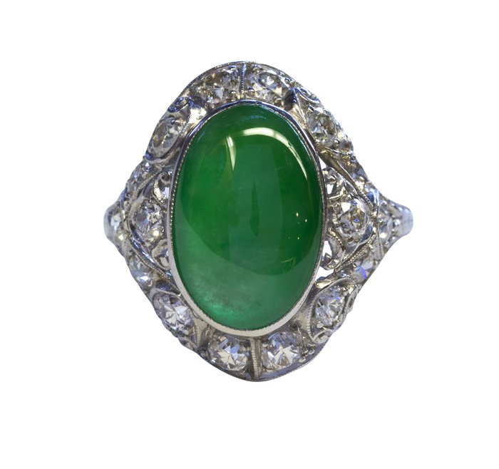 Art Deco jadeite diamond and platinum ring Mason-Kay: Art deco jadeite, diamond and platinum ring featuring an oval cabochon jadeite measuring approximately 13.0 x 8.4 x 5.2 mm, accompanied by a Mason-Kay Jadeite Authenticity report #292932, stating Natu