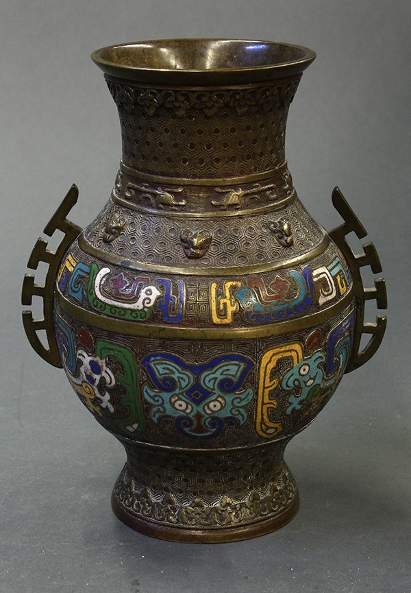 Chinese Champleve Vase: Chinese archaistic champleve vase, decorated with stylized birds and taotie mask on thunder patterned ground flanked by flanges, the base marked 'Bai Zhengjin zhi', 10.3"h
