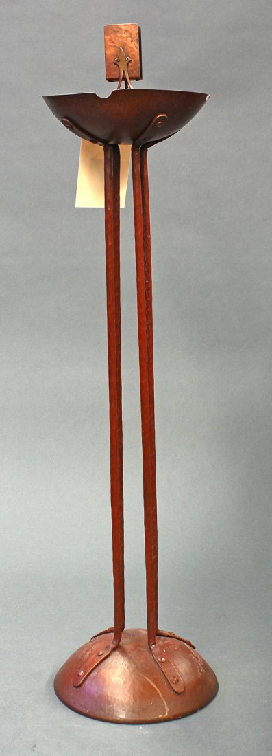 Arts and Crafts Dirk Van Erp stand ash tray: Arts and Crafts Dirk Van Erp stand ash tray, executed in hammered copper, centering a removable match-holder with strap handles, above a bowl receptacle rising on a four rod standard, resting on a dom