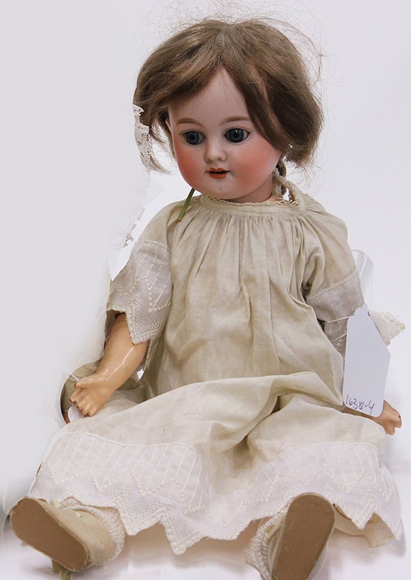 German antique bisque socket head doll, by Armand: Antique German bisque head doll, by Armand Marseille, 1894, the hand-decorated face set with pierced ears, and having molded and feathered eyebrows, blue paperweight sleep eyes, and an open mouth show