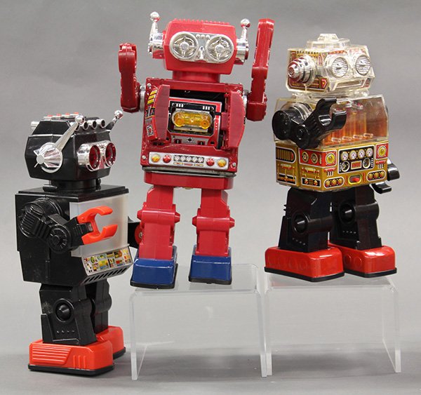 Vintage robots in original boxes: (lot of 7) Vintage robots in original boxes including Super Astronaut, Piston Robot, and Super Explorer
