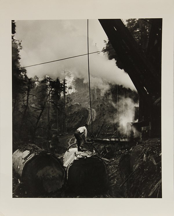 Photograph by Horace Bristol: Horace Bristol (American, 1909-1997) "Loading Redwood Log on Tractor in Forest, California," 1935, gelatin silver print, signed verso, title label affixed verso, print (unframed): 14"h x 11"w