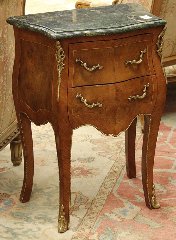 Louis XV style marble top commode: Louis XV style marble top commode, having a serpentine top above a conforming case accented with string banding and gilt mounts, the whole rising on cabriole legs terminating on sabots, 28"h x 20"w x