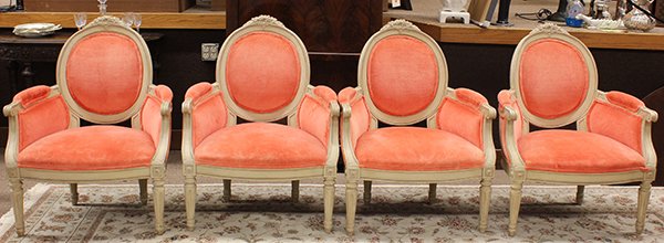 (lot of 4) Rococo style polychrome decorated bergeres: (lot of 4) Rococo style polychrome decorated bergeres, each having a carved crest surmounting the balloon back, and rising on turned, tapered legs, 37"h x 28"w x 21"d