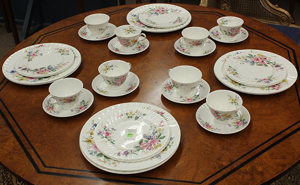 (lot of 24) Royal Doulton porcelain table service for: (lot of 24) Royal Doulton porcelain table service for eight, in the "Arcadia" pattern, executed in white with polychrome floral decoration, consisting of teacups and saucers, dinner plates, and salad 