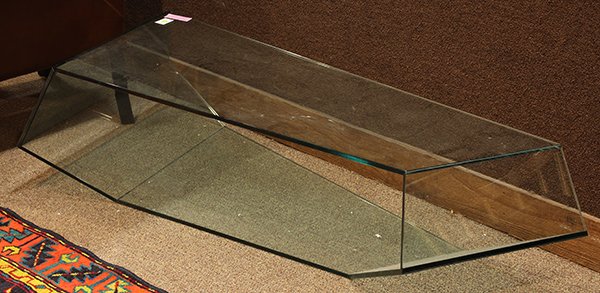 Italian Karim Rashid 'Dekon 2' glass coffee table for: Italian Karim Rashid 'Dekon 2' glass coffee table for Tonelli Design, executed in 2006, having a conjoined form executed in 12mm glass, 14.5"h x 48"w x 20"d