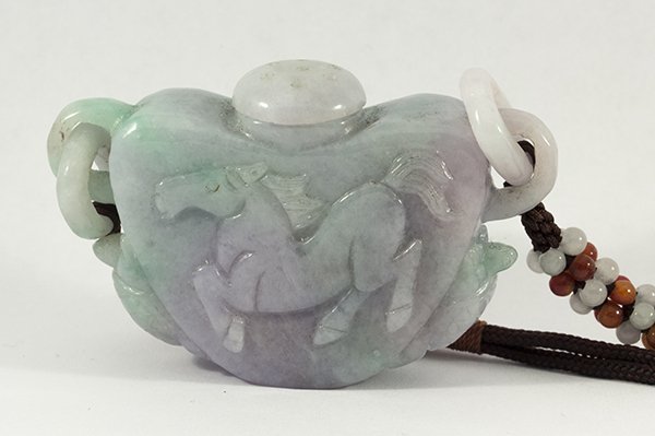Carved green lavender jadeite pendant Mason-Kay "A": Carved green and lavender jadeite pomander necklace featuring a carved pomander of a horse on the front and tortoise carvings on the sides, measures approximately 63.8 x 39.7 x 15.8 mm, accompanied by