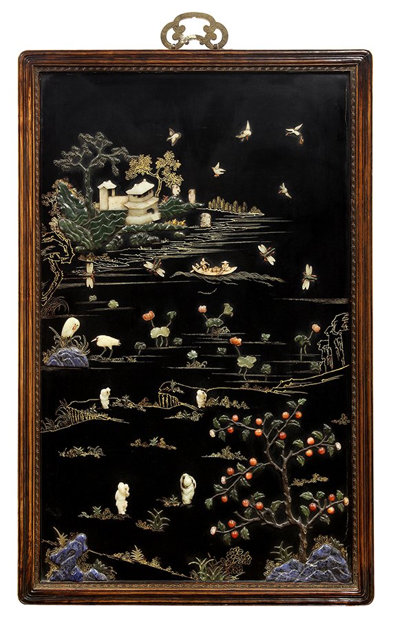 Chinese Inlaid Lacquer Wood Plaque, Lotus/Children: Chinese stone inlaid lacquer wood hanging panel, with children playing in the foreground near a tree with carnelian fruits, centered with a lotus pond with a boat, the background with a celadon pavili