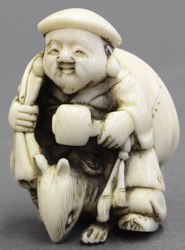 Japanese Ivory Netsuke, Daikoku: Japanese ivory netsuke, Daikoku (god of wealth) carrying a mallet and a bag slung over his back, mounted on a rat, marked Masataka (chip to one of the rat's front paws) 1.75"h