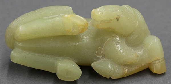 Chinese Yellow Jade Carving, Horse: Chinese yellow jade recumbent horse, cleaning its own hind hoof, 3.5"l