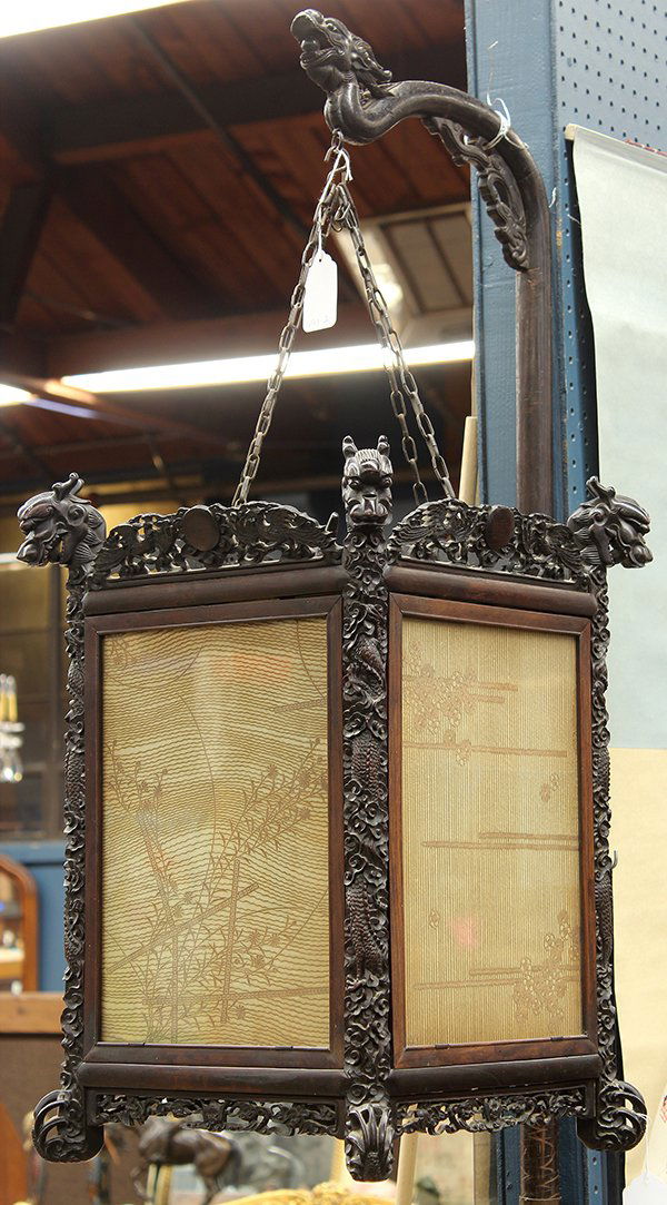 Chinese Wood Dragon Lantern: Chinese carved wooden rectangular lantern, late Qing/early Republic period, the edge carved with dragons accented with reticulated crest and apron, the sides insert with glass panels; together with a