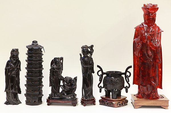 Six Chinese Composition Figures: (lot of 6) Chinese composition figures, consisting of a simulated amber piece of an emperor holding a ruyi scepter; one Guanyin with a scepter; one celestial beauty with a sprig; a seven story pagoda;