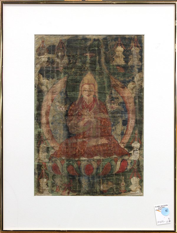 Himalayan Buddhist Monk Painting: Himalayan painted thangka, of a seated Buddhist monk with dharmachakra mudra, accented by stupa and ritual items, sight: 14.75"h x 10"w, overall (frame): 21.25"h x16.25"w. Provenance: The Jeff Sahadi 